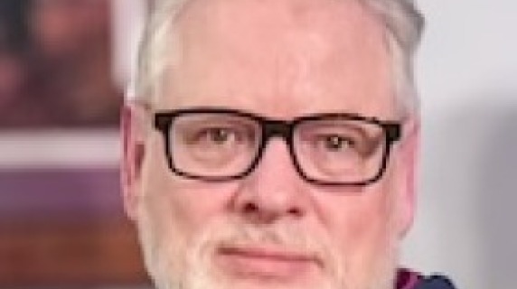 A headshot of Steve Oberg