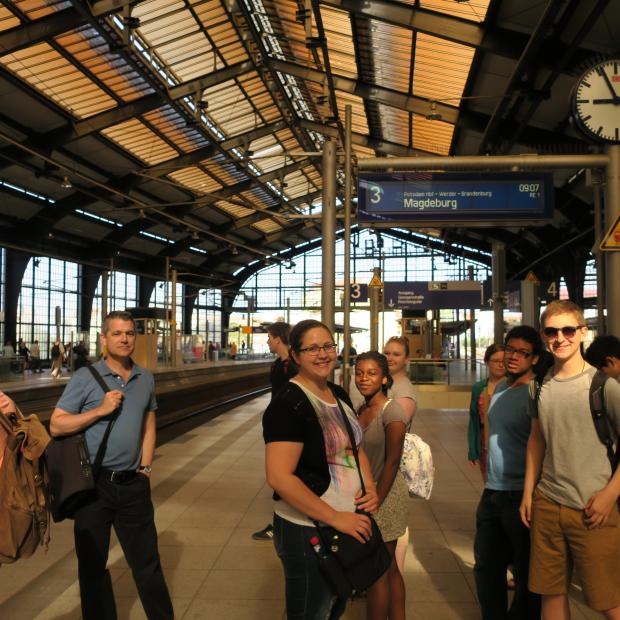 students at train station