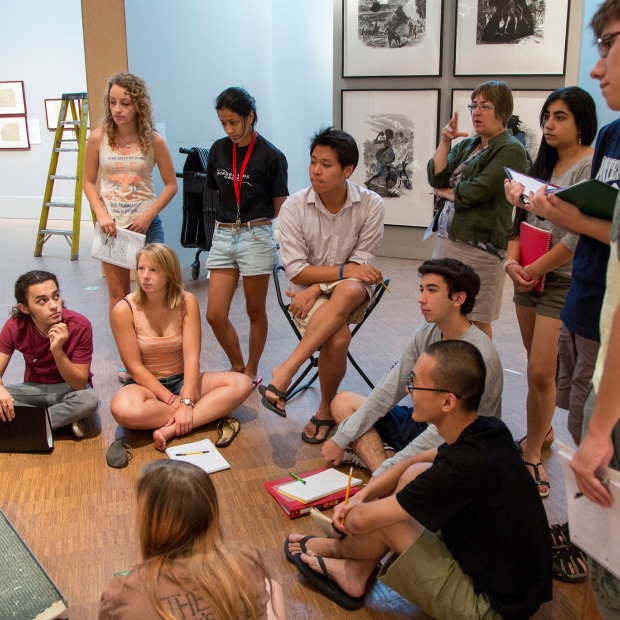 Students gather in Faulconer Gallery for a tutorial discussion