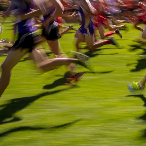 Blurred image of runners legs and feet