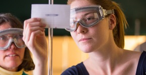 Leslie Lyons, Professor of Chemistry, works with a student in one of the labs in Noyce
