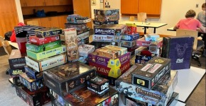 Large pile of assorted board games