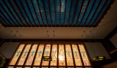 The colorful stained glass windows in the Jewel Box bank. 