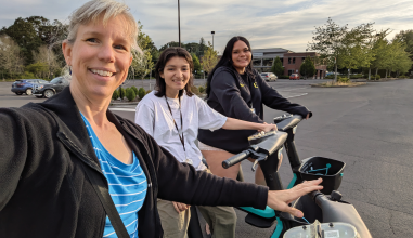 Beran and two other women with scooters taking a selfie