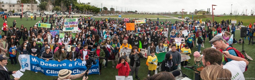 Marchers gather at the beginning of the Climate March