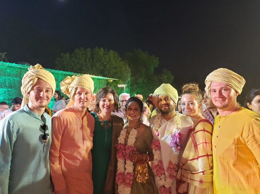 Sneha Saigal ’12 with her husband and American host family at her wedding
