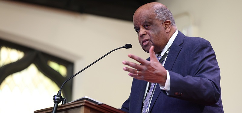 Randy Morgan ’65, DS ’92 speaks from a podium