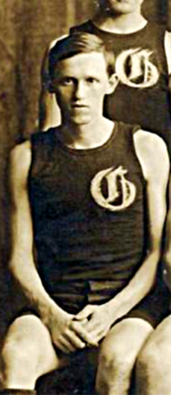 Vintage black and white photo of Harry Hopkins in a Grinnell basketball uniform
