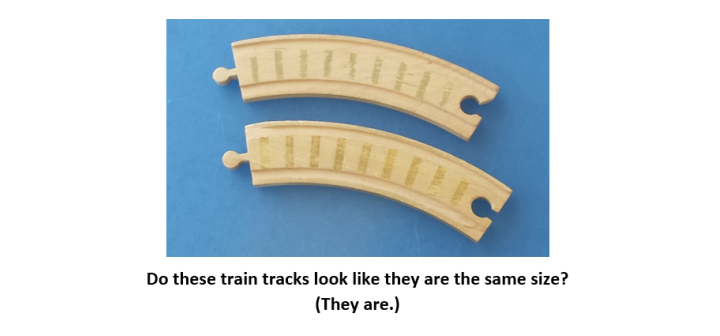 One of the optical illusions asked viewers to compare the length of two pieces of toy train track.