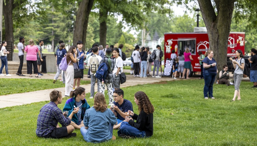 students eating ice cream in grass
