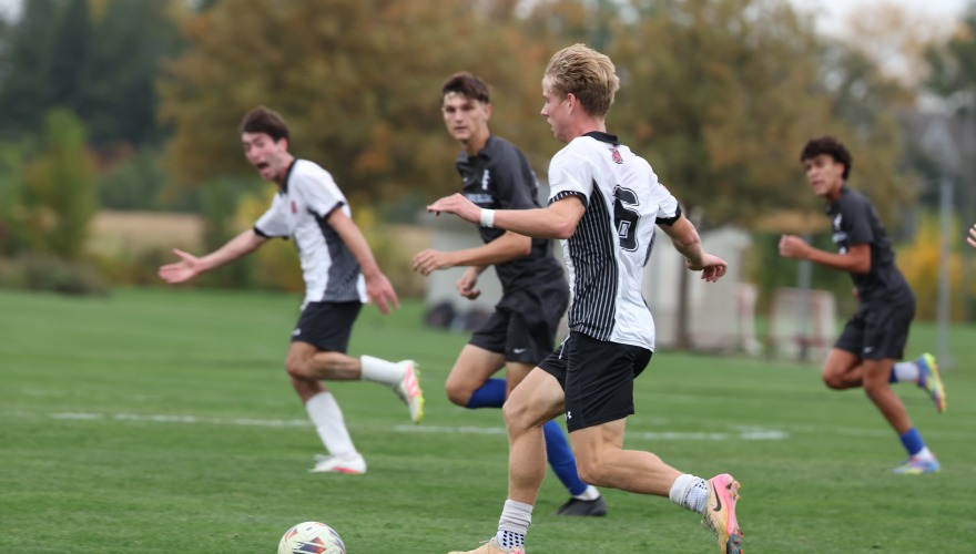 Four men's soccer players