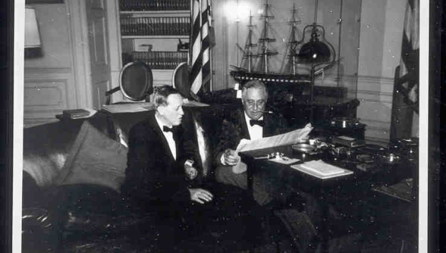 Vintage black and white photo of Harry Hopkins and FDR
