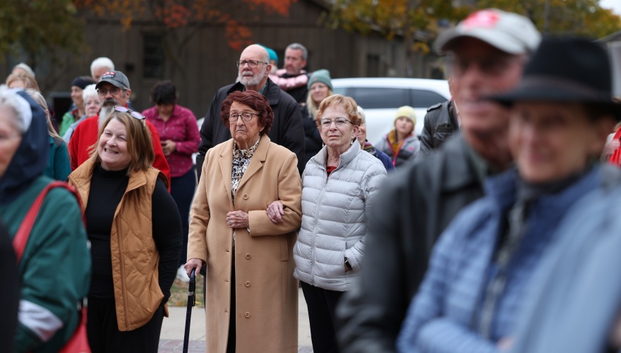 People listening to the speeches at ribbon cutting