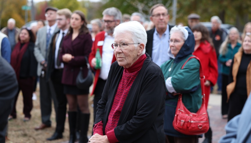 Women standing outside at ribbon cutting