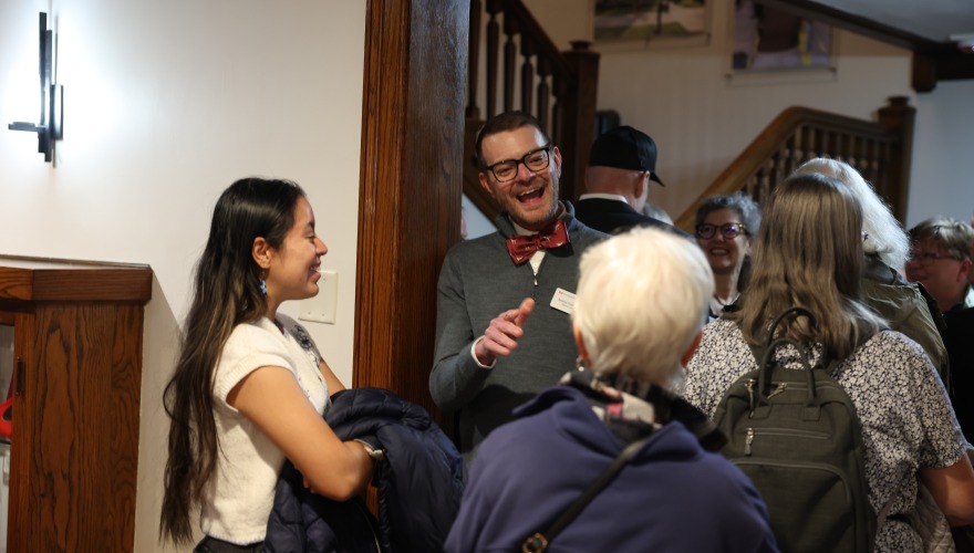 People laughing and talking inside the house