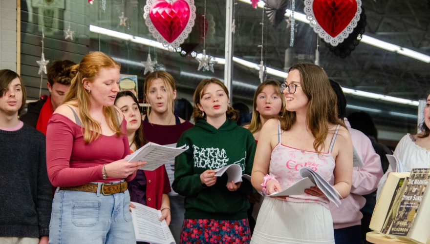 people singing in bookstore