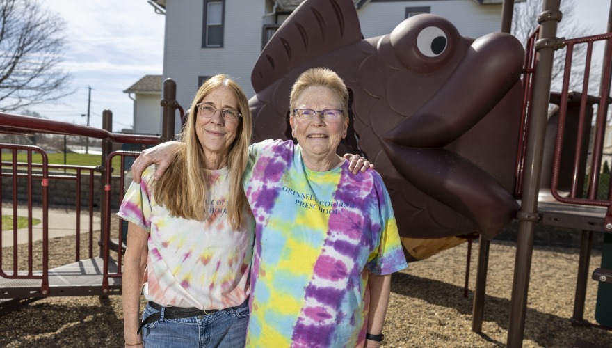 Karen and Connie Standing in front of Playground equipment