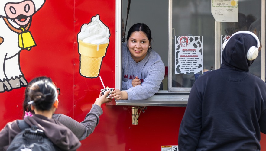 person handing out ice cream