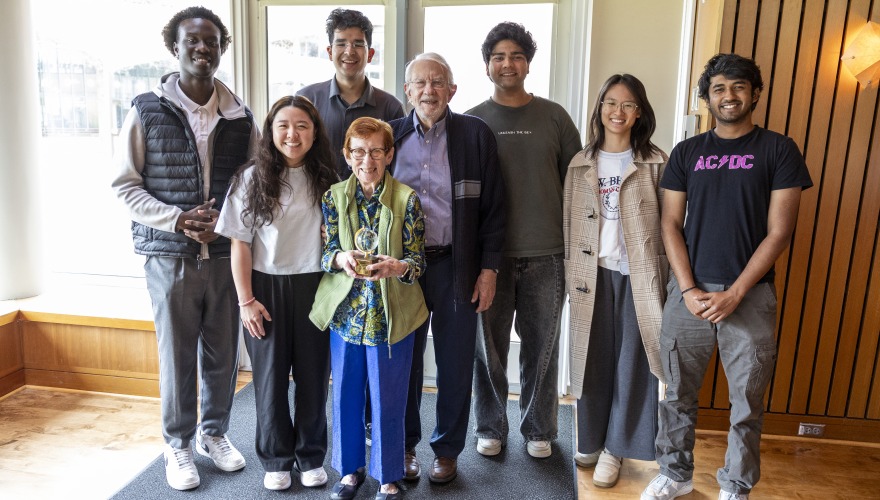 Students posing with Nancy and Al Maly