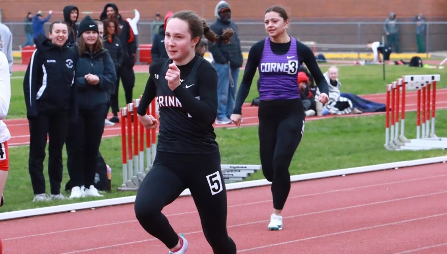 A runner sprints during the last leg of an outdoor race.