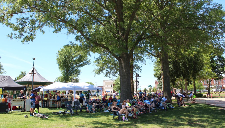 people sitting outside in park 