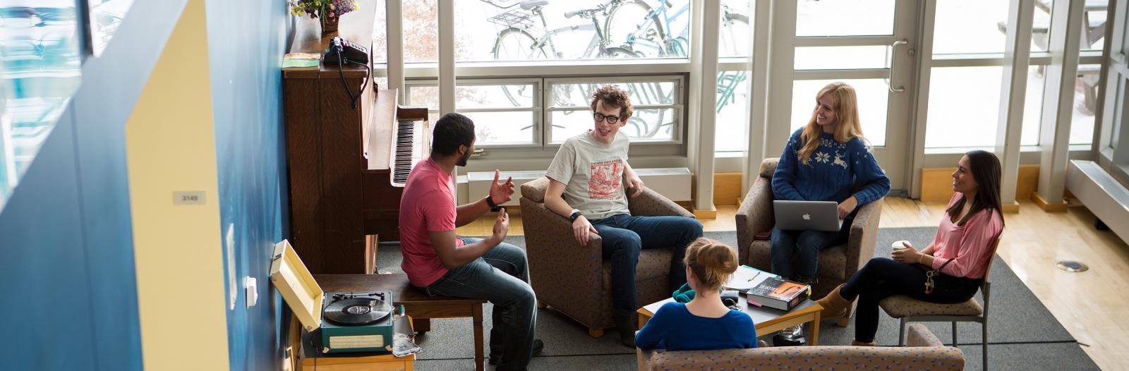 Students chat in dorm lobby