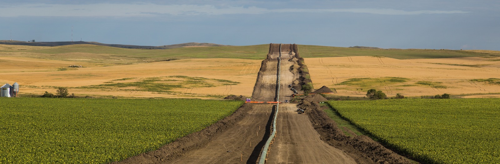 The Dakota Access Pipeline being installed between farms, as seen from 50th Avenue in New Salem, North Dakota. 