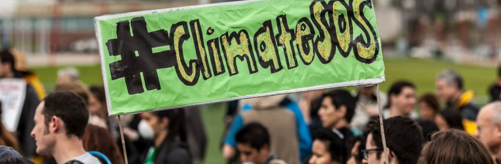 Green Climate sos banner at a march