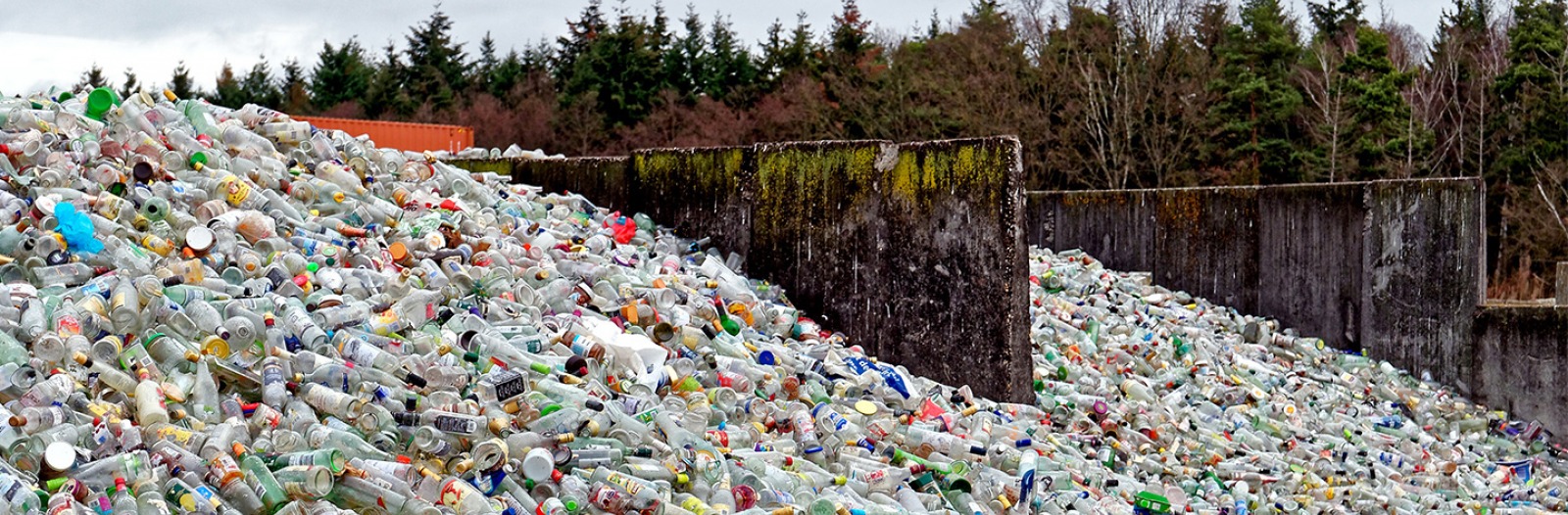 huge piles of trash at a landfill