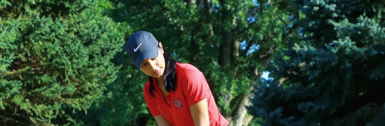 Vrishali Sinha playing golf