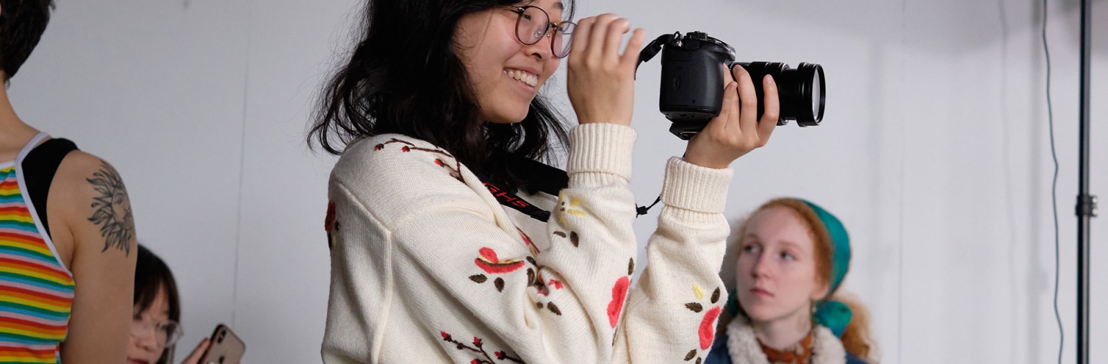 Nana Okamoto ’20 looks through the camera during Fundamentals of Video Production class