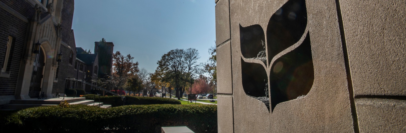 Grinnell College logo on stone gateway