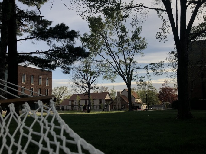 Hammock with the Humanities and Social Sciences Center and the Admission Building in the background