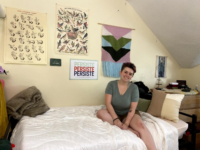 Sophie smile and shares what their dorm room looks like.