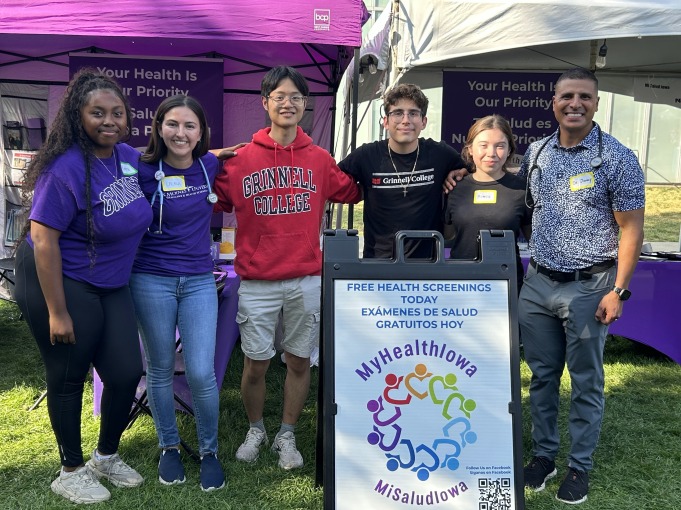 Medical volunteers at the Des Moines Latino Heritage Festival. Four of the volunteers are Grinnellians.