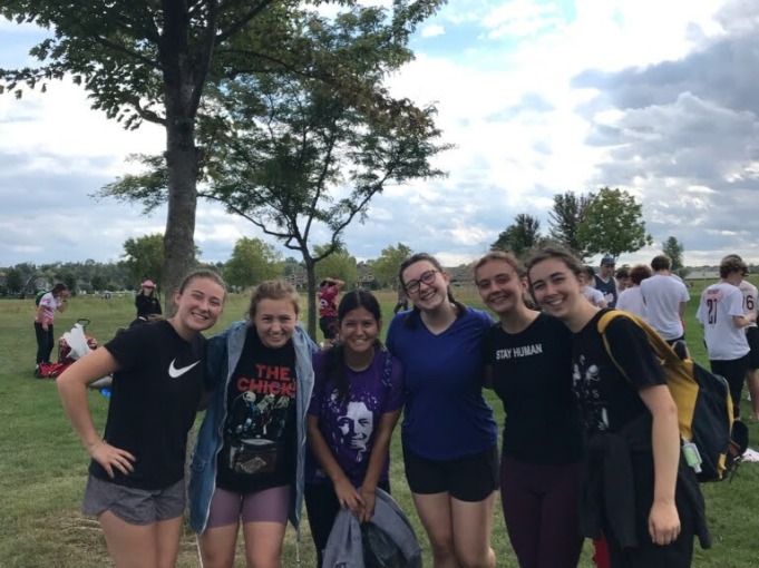 The first-year teammates in ultimate frisbee all gather together to take a photo at Exit 69 in Northfield, Minnesota.