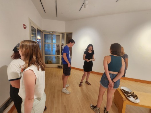 Students peruse the art gallery.