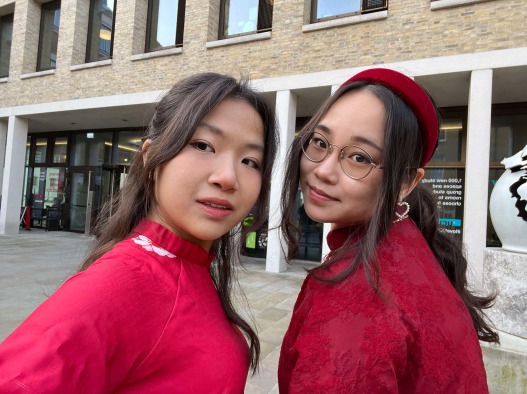 My friend and I wear red dresses for the Lunar New Year.