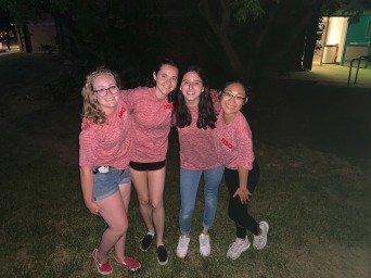 Camila Hassler and three others all wearing red NSO tshirts