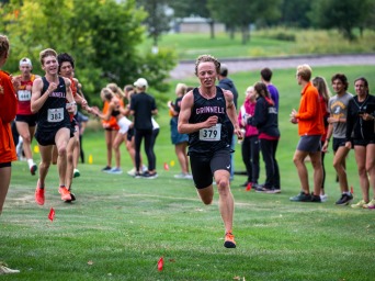 Andrew running in a Cross Country meet