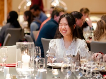 Phuong Tran at a fancy dinner.