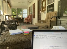 Photo of porch with computer in bottom left