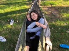 Two people in hammock 