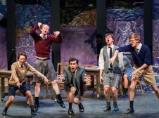 Five enthusiastic performers in a student production of Spring Awakening