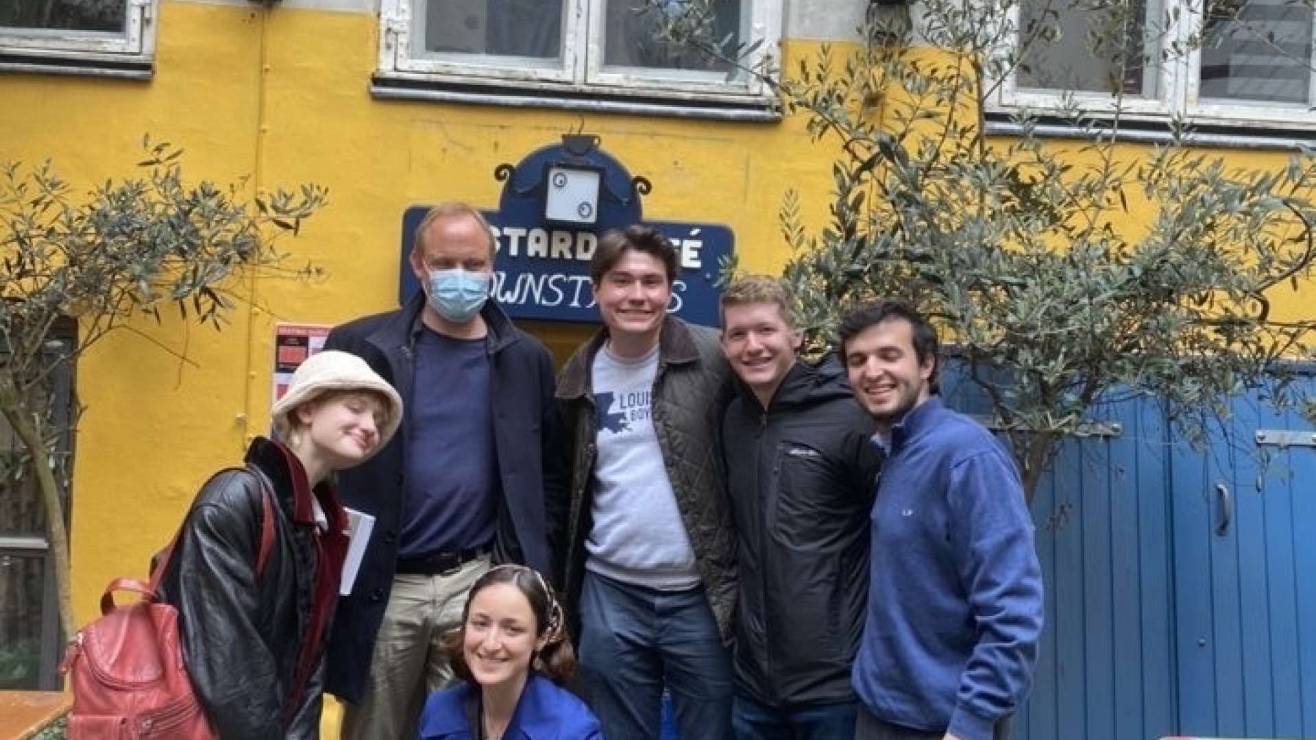 group photo in front of Bastard Cafe