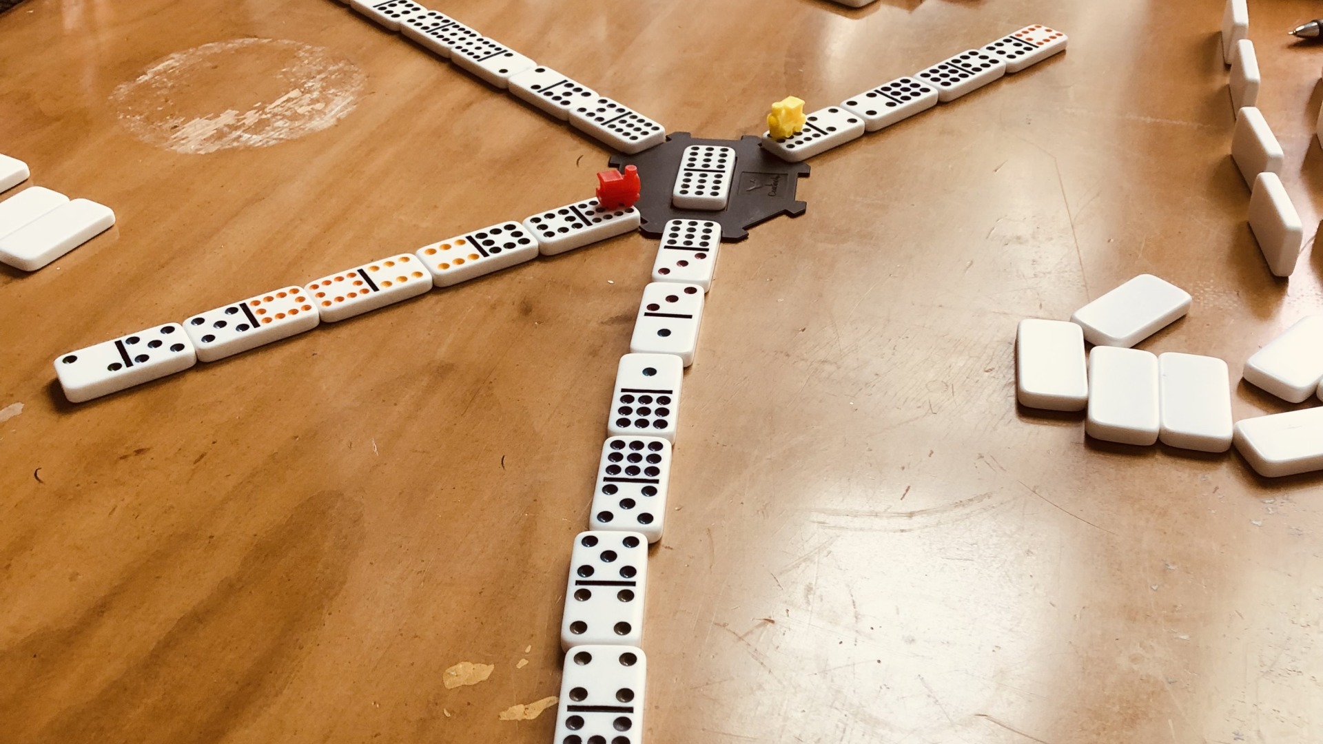 dominos mexican train game in progress
