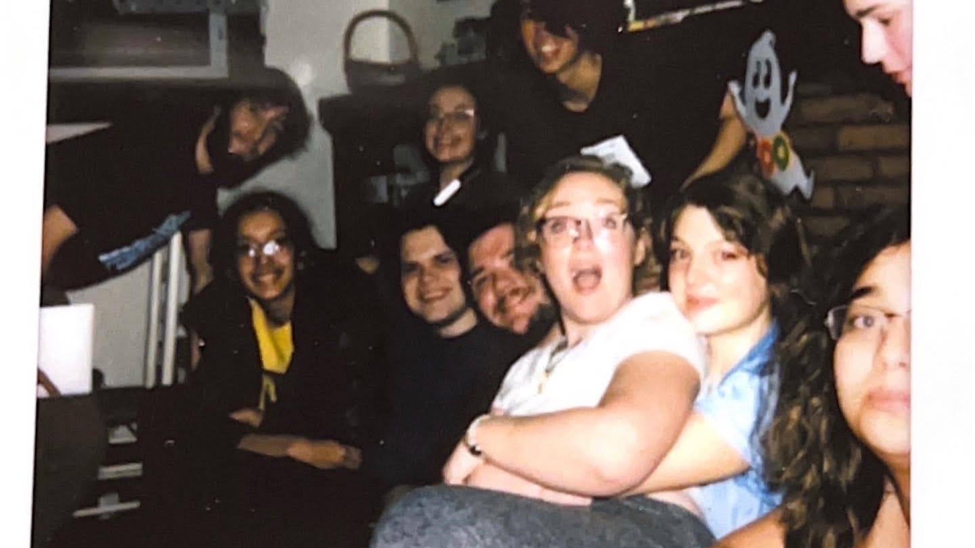 My friend is hugging me tightly in the photo and I'm surprised in a good way