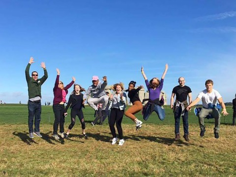 a group of students caught mid-leap
