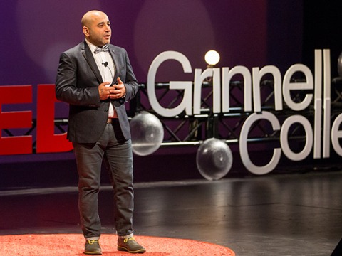 A speaker gives a TEDxGrinnellCollege talk.