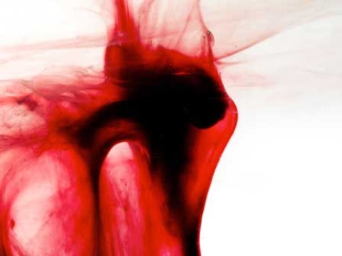 flow of red fluid against white background